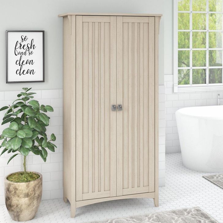 The appearance of Bush Furniture Salinas Bathroom Storage Cabinet with Doors in Antique White designed by Bush Furniture in the country / farmhouse interior design. This antique white piece of furniture  was selected by 1StopBedrooms from Salinas Collection to add a touch of cosiness and style into your home. Sku: SAL015AW. Product Type: Bathroom Storage. Image1