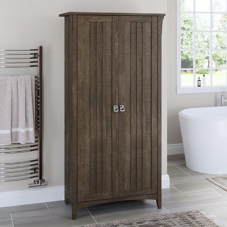 The appearance of Bush Furniture Salinas Bathroom Storage Cabinet with Doors in Ash Brown designed by Bush Furniture in the country / farmhouse interior design. This brown piece of furniture  was selected by 1StopBedrooms from Salinas Collection to add a touch of cosiness and style into your home. Sku: SAL015ABR. Product Type: Bathroom Storage. Image1