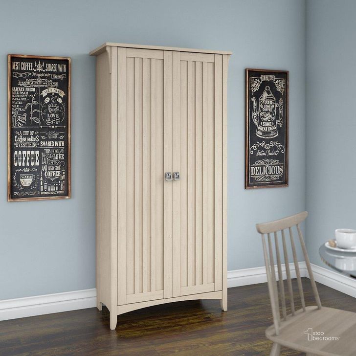 The appearance of Bush Furniture Salinas Kitchen Pantry Cabinet with Doors in Antique White designed by Bush Furniture in the country / farmhouse interior design. This antique white piece of furniture  was selected by 1StopBedrooms from Salinas Collection to add a touch of cosiness and style into your home. Sku: SAL014AW. Product Type: Cabinet. Image1
