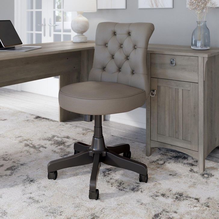 The appearance of Bush Furniture Salinas Mid Back Tufted Office Chair in Washed Gray Leather designed by Bush Furniture in the country / farmhouse interior design. This washed grey piece of furniture  was selected by 1StopBedrooms from Salinas Collection to add a touch of cosiness and style into your home. Sku: SAL009WG. Product Type: Office Chair. Image1