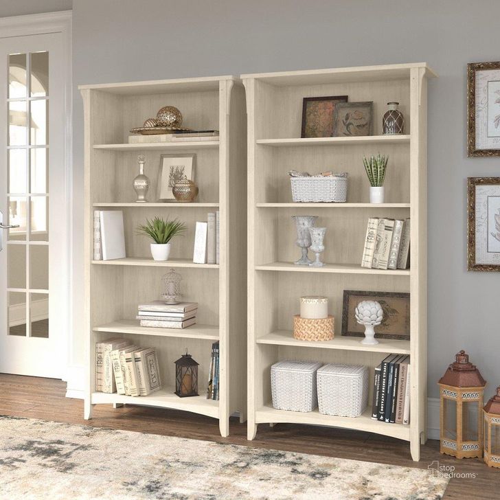 The appearance of Bush Furniture Salinas Tall 5 Shelf Bookcase - Set of 2 in Antique White designed by Bush Furniture in the country / farmhouse interior design. This antique white piece of furniture  was selected by 1StopBedrooms from Salinas Collection to add a touch of cosiness and style into your home. Sku: SAL036AW. Product Type: Bookcase. Image1
