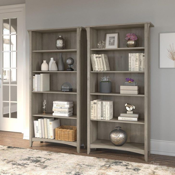 The appearance of Bush Furniture Salinas Tall 5 Shelf Bookcase - Set of 2 in Driftwood Gray designed by Bush Furniture in the country / farmhouse interior design. This driftwood piece of furniture  was selected by 1StopBedrooms from Salinas Collection to add a touch of cosiness and style into your home. Sku: SAL036DG. Product Type: Bookcase. Image1