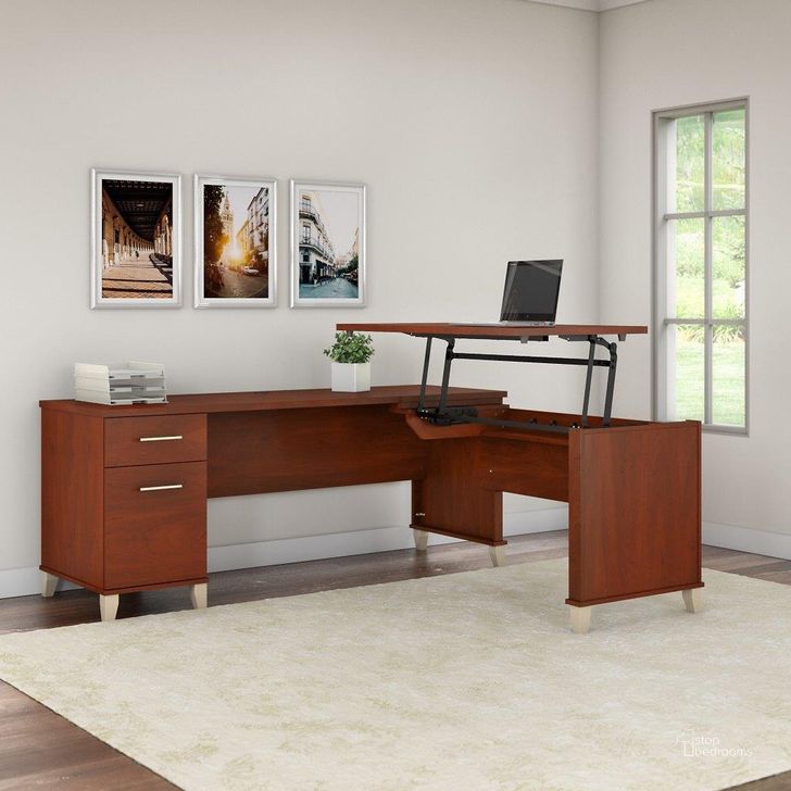 The appearance of Bush Furniture Somerset 72W 3 Position Sit To Stand L Shaped Desk in Hansen Cherry designed by Bush Furniture in the modern / contemporary interior design. This hansen cherry piece of furniture  was selected by 1StopBedrooms from Somerset Collection to add a touch of cosiness and style into your home. Sku: SET014HC. Product Type: Desk. Image1