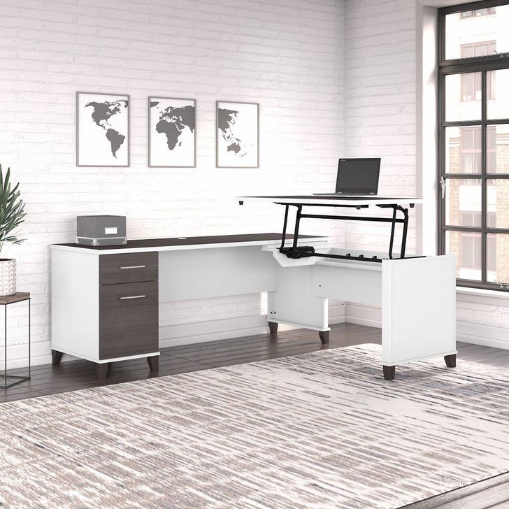 The appearance of Bush Furniture Somerset 72W 3 Position Sit To Stand L Shaped Desk in White and Storm Gray designed by Bush Furniture in the modern / contemporary interior design. This storm gray and white piece of furniture  was selected by 1StopBedrooms from Somerset Collection to add a touch of cosiness and style into your home. Sku: SET014SGWH. Product Type: Desk. Image1