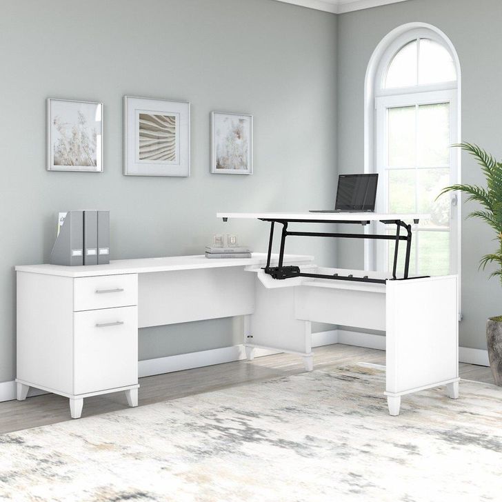 The appearance of Bush Furniture Somerset 72W 3 Position Sit To Stand L Shaped Desk in White designed by Bush Furniture in the modern / contemporary interior design. This white piece of furniture  was selected by 1StopBedrooms from Somerset Collection to add a touch of cosiness and style into your home. Sku: SET014WH. Product Type: Desk. Image1