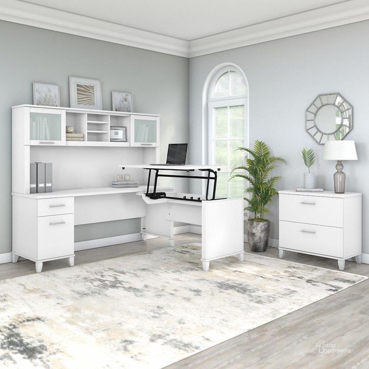 The appearance of Bush Furniture Somerset 72W 3 Position Sit To Stand L Shaped Desk with Hutch and File Cabinet in White designed by Bush Furniture in the modern / contemporary interior design. This white piece of furniture  was selected by 1StopBedrooms from Somerset Collection to add a touch of cosiness and style into your home. Sku: SET016WH. Product Type: Desk & Hutch. Image1