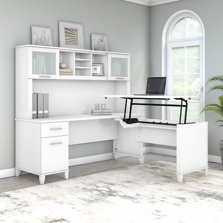 The appearance of Bush Furniture Somerset 72W 3 Position Sit To Stand L Shaped Desk with Hutch in White designed by Bush Furniture in the modern / contemporary interior design. This white piece of furniture  was selected by 1StopBedrooms from Somerset Collection to add a touch of cosiness and style into your home. Sku: SET015WH. Product Type: Desk & Hutch. Image1