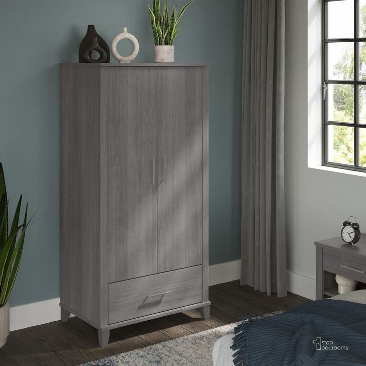 The appearance of Bush Furniture Somerset Large Armoire Cabinet In Platinum Gray designed by Bush Furniture in the modern / contemporary interior design. This platinum gray piece of furniture  was selected by 1StopBedrooms from Somerset Collection to add a touch of cosiness and style into your home. Sku: STS166PGK. Product Type: Armoire. Image1