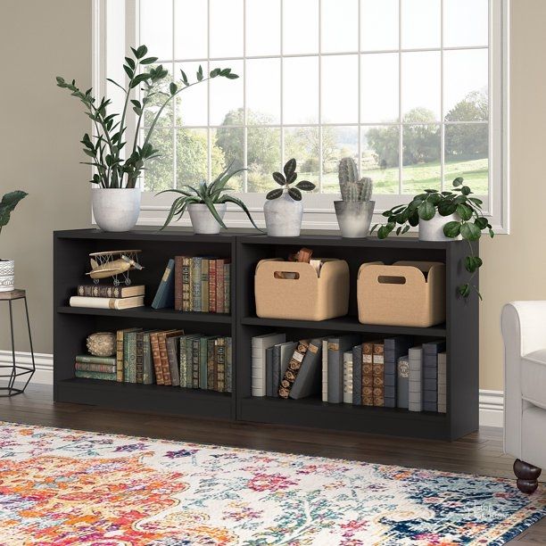 The appearance of Bush Furniture Universal 2 Shelf Bookcase Set Of 2 In Classic Black designed by Bush Furniture in the modern / contemporary interior design. This black piece of furniture  was selected by 1StopBedrooms from Universal Collection to add a touch of cosiness and style into your home. Sku: UB001BL. Product Type: Bookcase. Image1