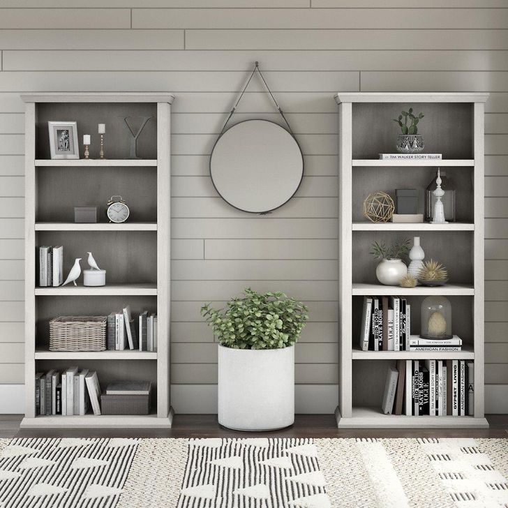 The appearance of Bush Furniture Yorktown Tall 5 Shelf Bookcase Set Of 2 In Linen White Oak designed by Bush Furniture in the country / farmhouse interior design. This white piece of furniture  was selected by 1StopBedrooms from Yorktown Collection to add a touch of cosiness and style into your home. Sku: YRK012LW. Product Type: Bookcase. Image1