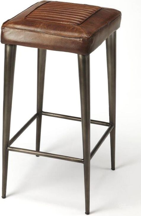 The appearance of Butler Maxine Leather Bar Stool designed by Butler Specialty Company in the modern / contemporary interior design. This dark brown piece of furniture  was selected by 1StopBedrooms from Industrial Chic Collection to add a touch of cosiness and style into your home. Sku: 4346344. Product Type: Barstool. Material: Iron. Image1
