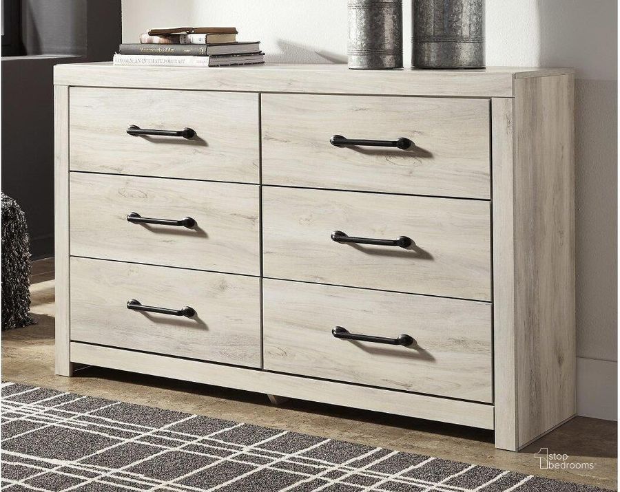 The appearance of Cambeck White Wash Dresser designed by Signature Design by Ashley in the transitional interior design. This white wash piece of furniture  was selected by 1StopBedrooms from Cambeck Collection to add a touch of cosiness and style into your home. Sku: B192-31. Material: Wood. Product Type: Dresser. Image1