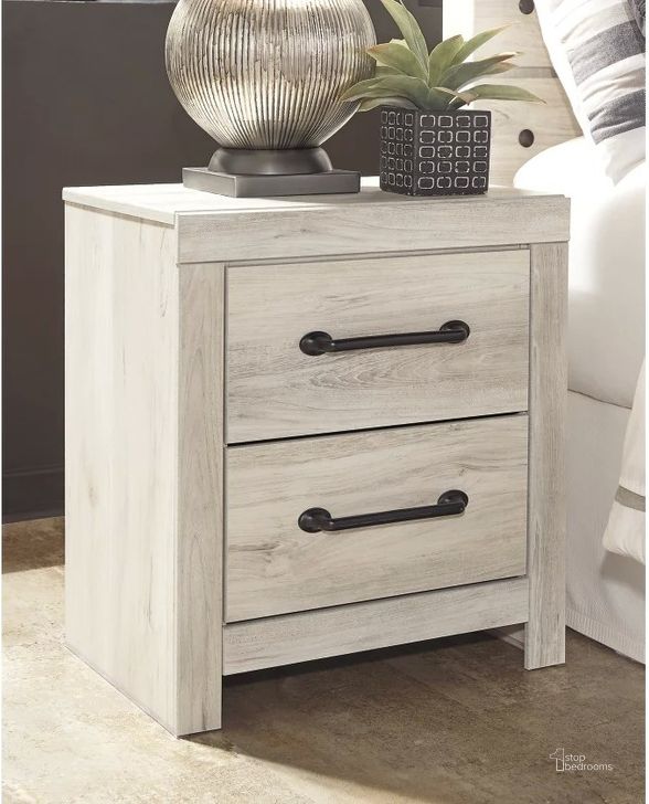 The appearance of Cambeck White Wash Two Drawer Night Stand designed by Signature Design by Ashley in the transitional interior design. This white wash piece of furniture  was selected by 1StopBedrooms from Cambeck Collection to add a touch of cosiness and style into your home. Sku: B192-92. Material: Wood. Product Type: Nightstand. Image1