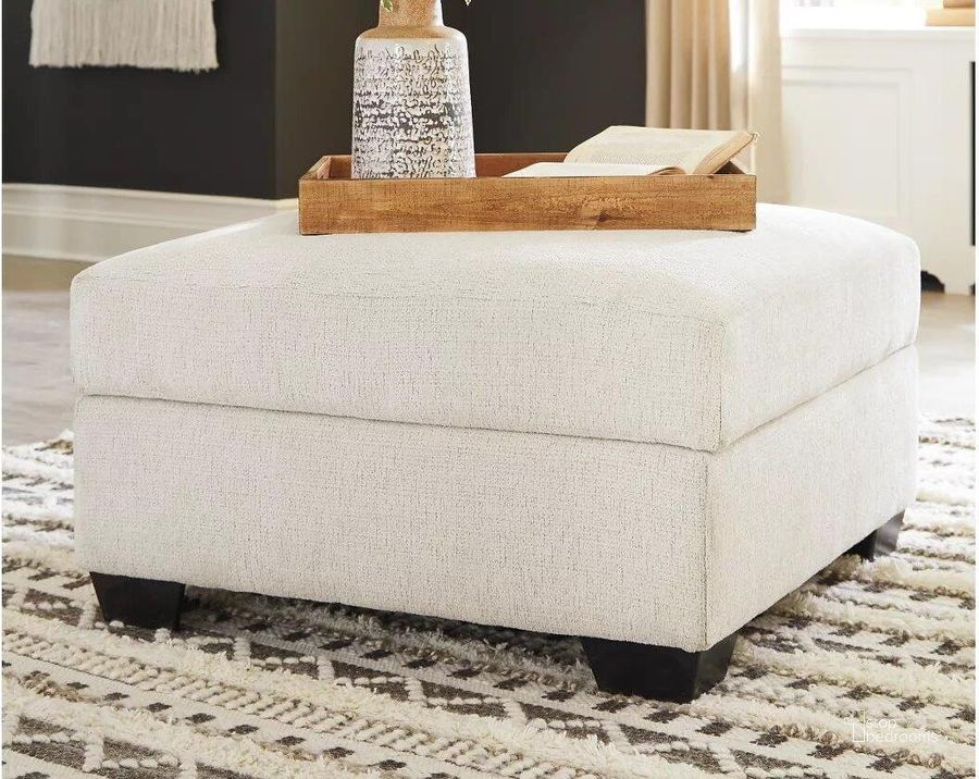 The appearance of Cambri Snow Ottoman With Storage designed by Signature Design by Ashley in the modern / contemporary interior design. This snow piece of furniture  was selected by 1StopBedrooms from Cambri Collection to add a touch of cosiness and style into your home. Sku: 9280111. Material: Fabric. Product Type: Ottoman. Image1