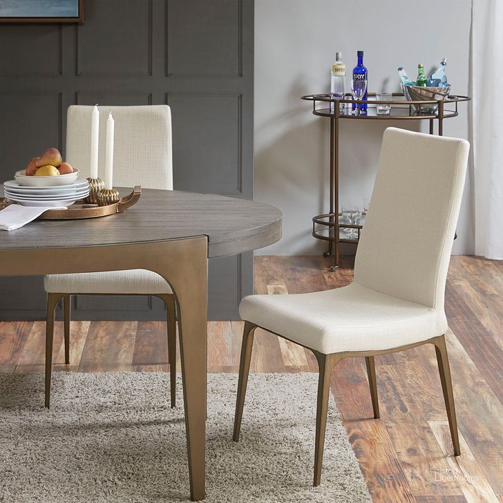 The appearance of Captiva Dining Side Chair Set Of 2 In Cream designed by Olliix in the transitional interior design. This cream piece of furniture  was selected by 1StopBedrooms from Captiva Collection to add a touch of cosiness and style into your home. Sku: MP108-0642. Material: Polyester. Product Type: Dining Chair. Image1