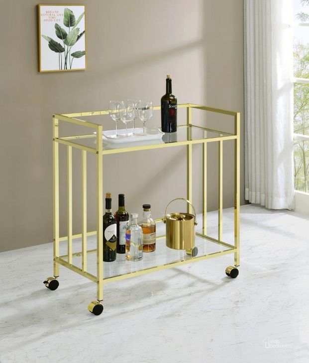 The appearance of Cara Rectangular Glass Bar Cart Brass designed by Coaster in the modern / contemporary interior design. This brass piece of furniture  was selected by 1StopBedrooms from Cara Collection to add a touch of cosiness and style into your home. Sku: 181381. Material: Glass. Product Type: Bar Cart. Image1