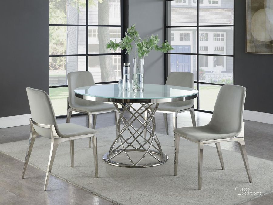 The appearance of Carmangay Chrome Dining Set designed by Versailles Home in the modern / contemporary interior design. This chrome piece of furniture  was selected by 1StopBedrooms from Carmangay Collection to add a touch of cosiness and style into your home. Sku: 110401B1;110401B2;110401B3;110402B1;110402B2. Table Base Style: Pedestal. Table Top Shape: Round. Material: Steel. Product Type: Dining Room Set. Size: 51". Image1
