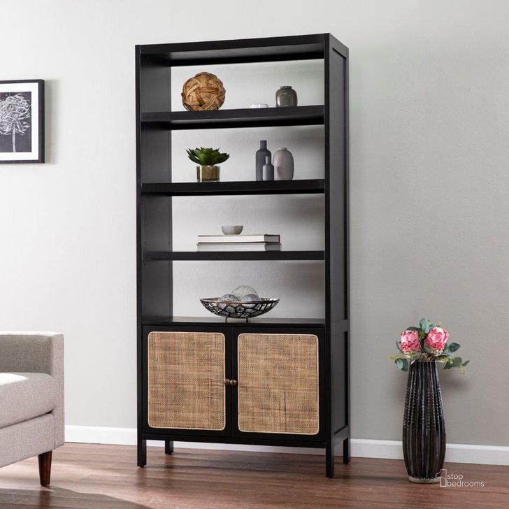 The appearance of Carondale Bookcase With Storage Shelf designed by SEI Furniture in the transitional interior design. This black piece of furniture  was selected by 1StopBedrooms from Carondale Collection to add a touch of cosiness and style into your home. Sku: HZ1096138. Material: Wood. Product Type: Bookcase. Image1