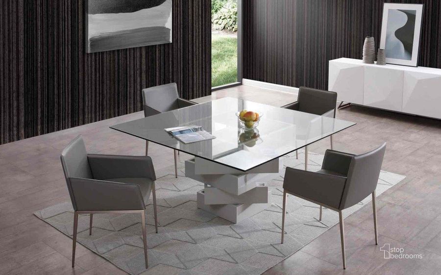 The appearance of Carson Grey Dining Table designed by Whiteline Modern Living in the modern / contemporary interior design. This grey high gloss piece of furniture  was selected by 1StopBedrooms from Carson Collection to add a touch of cosiness and style into your home. Sku: DT1402-GRY. Table Base Style: Pedestal. Table Top Shape: Square. Material: Glass. Product Type: Dining Table. Image1