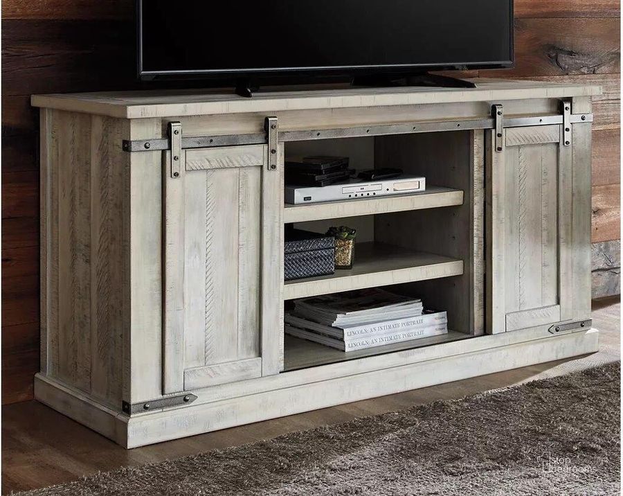 The appearance of Carynhurst White Wash Large Tv Stand designed by Signature Design by Ashley in the transitional interior design. This white wash piece of furniture  was selected by 1StopBedrooms from Carynhurst Collection to add a touch of cosiness and style into your home. Sku: W755-48. Material: Wood. Product Type: TV Stand. Image1