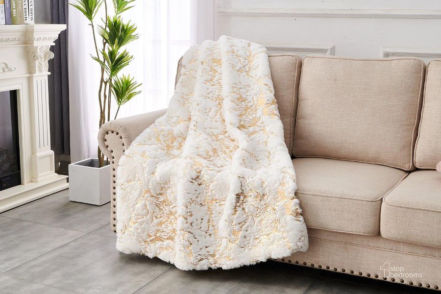 The appearance of Cassilda Luxury Chinchilla Faux Fur Gilded Throw Blanket In Gold and White designed by Amazing Rugs in the modern / contemporary interior design. This gold and white piece of furniture  was selected by 1StopBedrooms from Casilda Collection to add a touch of cosiness and style into your home. Sku: RSTGLSPWT5060. Material: Polyester. Product Type: Throw. Image1