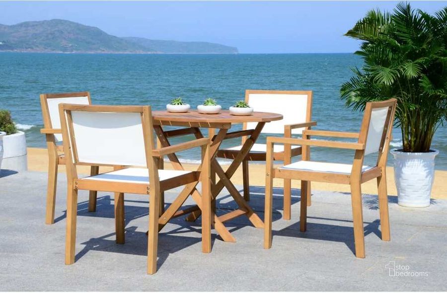 The appearance of Chante Teak 35.4 Inch Round Table 5-Piece Dining Set designed by Safavieh in the modern / contemporary interior design. This natural piece of furniture  was selected by 1StopBedrooms from Safavieh PAT Collection to add a touch of cosiness and style into your home. Sku: PAT7041A. Table Base Style: Trestle. Table Top Shape: Round. Material: Steel. Product Type: Outdoor Dining Set. Image1