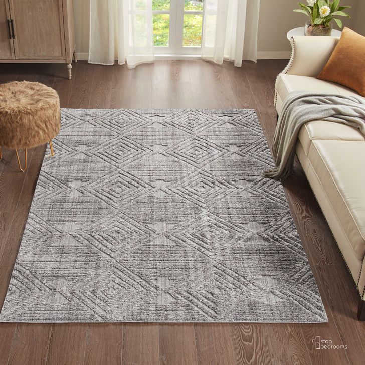 The appearance of Charlotte Polyester Terni Geo Gray Indoor Area Rug In Gray designed by Olliix in the modern / contemporary interior design. This gray piece of furniture  was selected by 1StopBedrooms from Charlotte Collection to add a touch of cosiness and style into your home. Sku: MP35-7184. Material: Polyester. Product Type: Rug. Image1