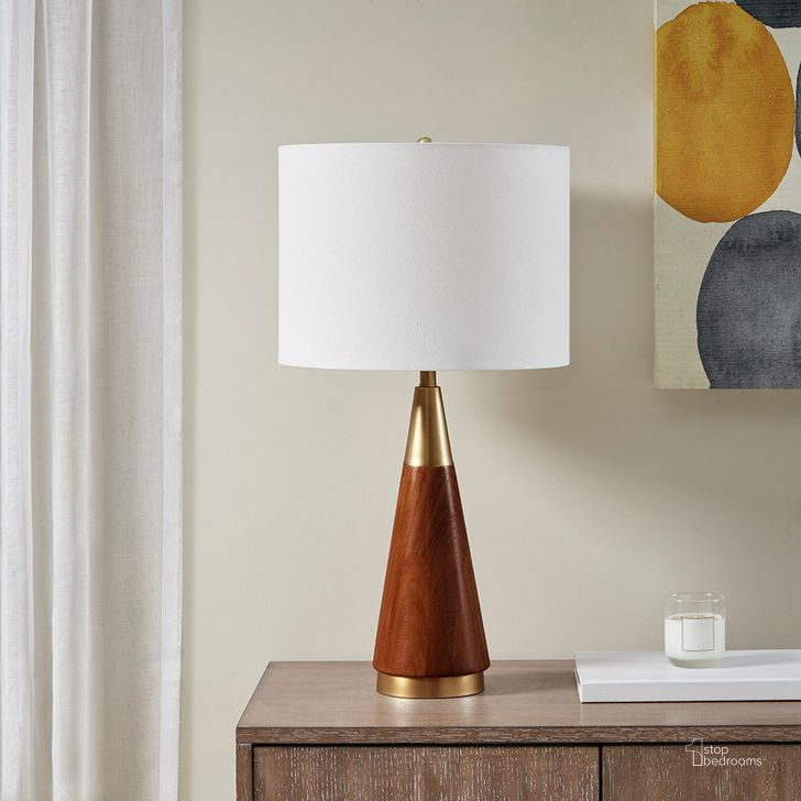 The appearance of Chrislie Table Lamp In Gold/Brown designed by Olliix in the modern / contemporary interior design. This gold/brown piece of furniture  was selected by 1StopBedrooms from Chrislie Collection to add a touch of cosiness and style into your home. Sku: II153-0006. Material: Wood. Product Type: Table Lamp. Image1