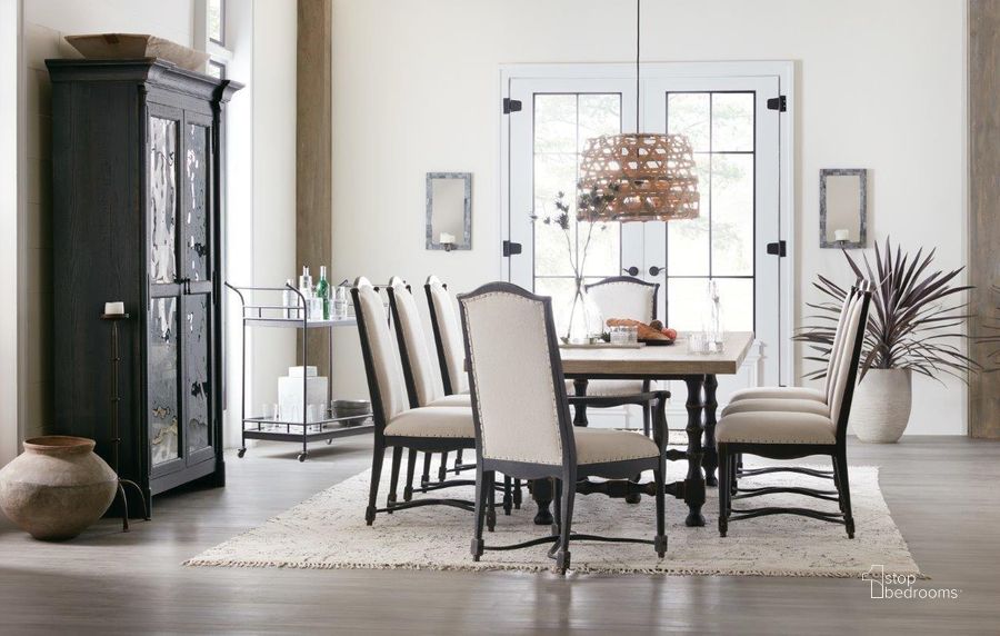 The appearance of Ciao Bella Black 84 Inch Extendable Dining Room Set designed by Hooker in the transitional interior design. This black piece of furniture  was selected by 1StopBedrooms from Ciaobella Collection to add a touch of cosiness and style into your home. Sku: 5805-75200B-99;5805-75200T-80;5805-75310-99. Table Base Style: Trestle. Product Type: Dining Room Set. Table Top Shape: Rectangular. Material: Pine. Image1