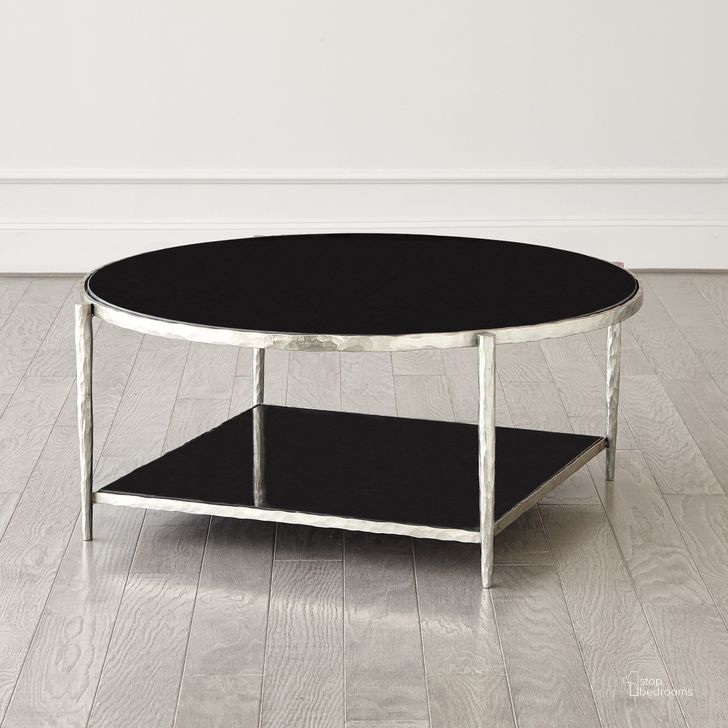 The appearance of Circle Square Cocktail Table In Nickel With Black Granite designed by Global Views in the modern / contemporary interior design. This black piece of furniture  was selected by 1StopBedrooms from Circle Collection to add a touch of cosiness and style into your home. Sku: 9.93686. Product Type: Cocktail Table. Material: Iron. Image1