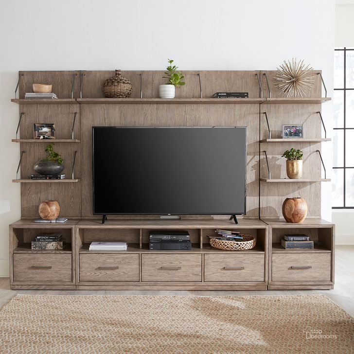 The appearance of City Scape Entertainment Center With Piers In Burnished Beige designed by Liberty in the modern / contemporary interior design. This beige piece of furniture  was selected by 1StopBedrooms from City Scape Collection to add a touch of cosiness and style into your home. Sku: 421-EP00T;421-EP00T;421-EP00B;421-EP00B;421-TV70;421-ED70. Product Type: Entertainment Center. Material: Rubberwood. Image1