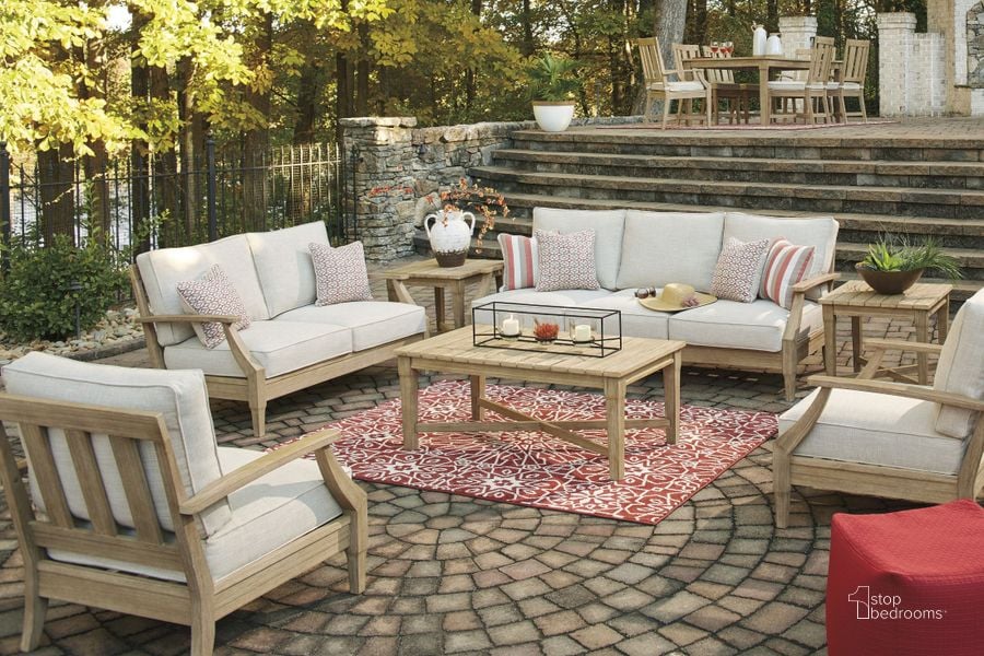 The appearance of Clare View Beige Outdoor Living Room Set with Cushion designed by Signature Design by Ashley in the transitional interior design. This beige piece of furniture  was selected by 1StopBedrooms from Clare View Collection to add a touch of cosiness and style into your home. Sku: P801-838;P801-835. Material: Fabric. Product Type: Outdoor Set. Image1