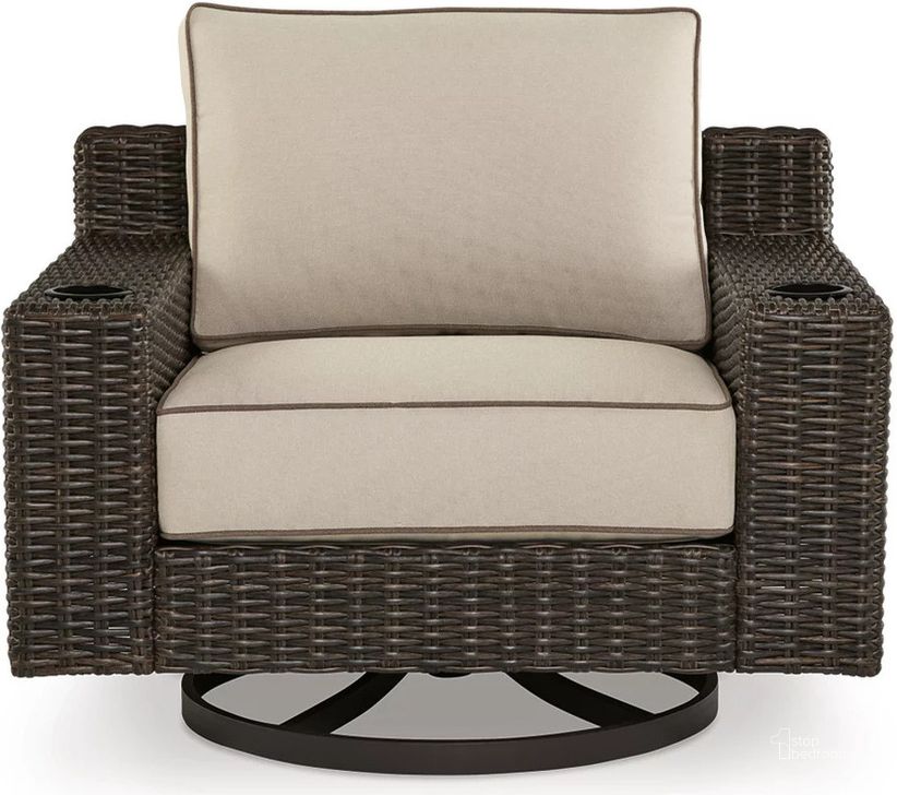 The appearance of Coastline Bay Brown Swivel Lounge With Cushion designed by Signature Design by Ashley in the transitional interior design. This brown piece of furniture  was selected by 1StopBedrooms from Coastline Bay Collection to add a touch of cosiness and style into your home. Sku: P784-821. Material: Fabric. Product Type: Outdoor Lounge Chair. Image1