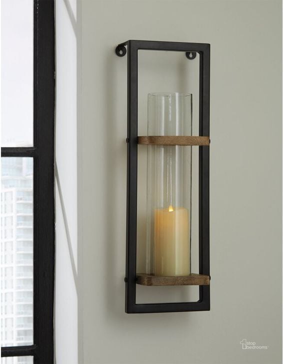 The appearance of Colburn Natural And Black Wall Sconce designed by Signature Design by Ashley in the transitional interior design. This natural/black piece of furniture  was selected by 1StopBedrooms from Colburn Collection to add a touch of cosiness and style into your home. Sku: A8010171. Material: Glass. Product Type: Wall Sconce. Image1
