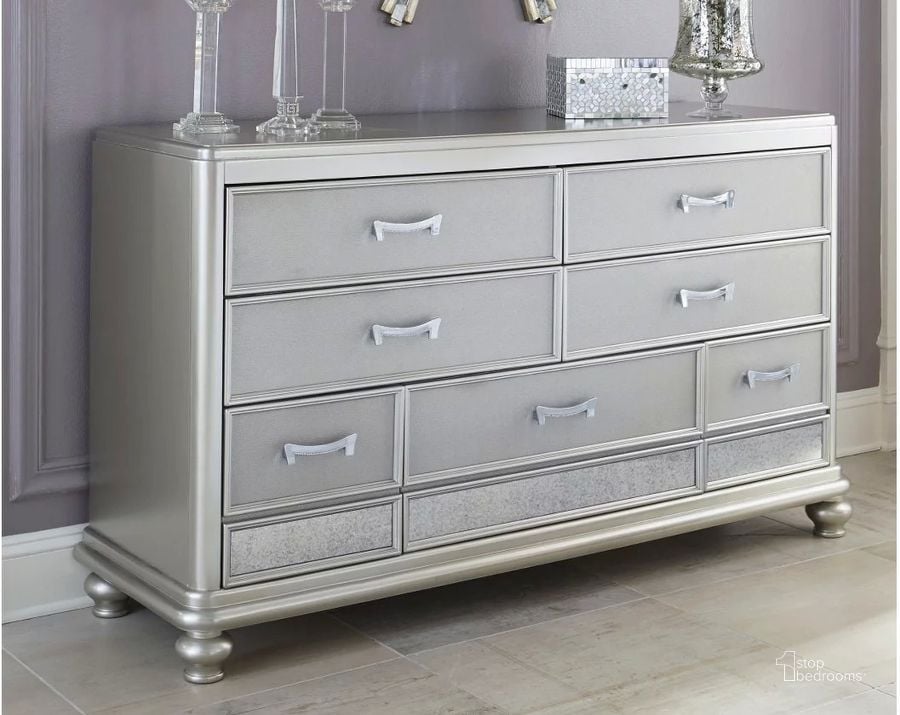 The appearance of Coralayne Silver 7 Drawer Dresser designed by Signature Design by Ashley in the modern / contemporary interior design. This silver piece of furniture  was selected by 1StopBedrooms from Coralayne Collection to add a touch of cosiness and style into your home. Sku: B650-31. Material: Wood. Product Type: Dresser. Image1