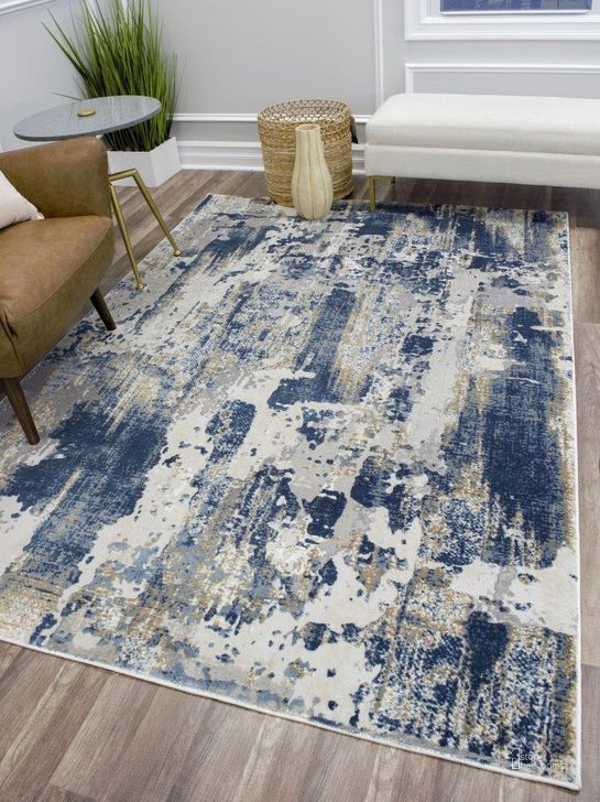 The appearance of CosmoLiving By Cosmopolitan Astor AD40D Sapphire Blue Transitional Abstract Ivory 2' x 4' Area Rug designed by Rugs America in the transitional interior design. This ivory piece of furniture  was selected by 1StopBedrooms from Astor Collection to add a touch of cosiness and style into your home. Sku: RA28869. Material: Polyester. Product Type: Area Rugs. Image1