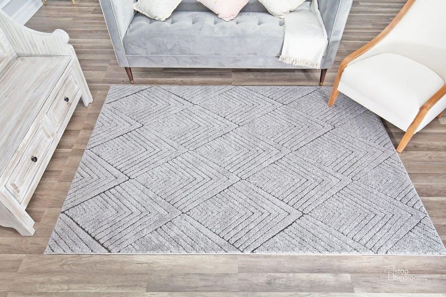 The appearance of CosmoLiving By Cosmopolitan Chanai CN30B Soapstone Geometric Contemporary Gray 5' x 7'6 Area Rug designed by Rugs America in the modern / contemporary interior design. This gray piece of furniture  was selected by 1StopBedrooms from Chanai Collection to add a touch of cosiness and style into your home. Sku: RA29164. Material: Polypropylene. Product Type: Area Rugs. Image1