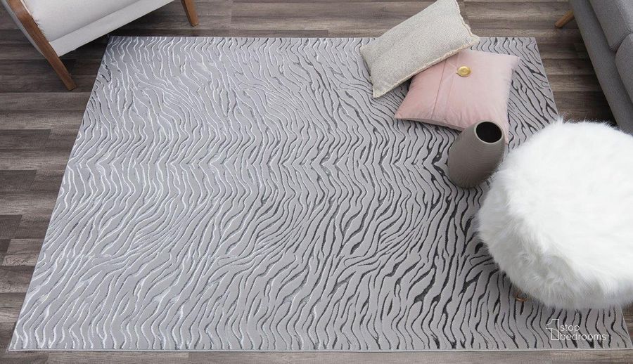 The appearance of CosmoLiving By Cosmopolitan Natura HZ60B Gray Tiger Animal Contemporary Gray 8' x 10' Area Rug designed by Rugs America in the modern / contemporary interior design. This gray piece of furniture  was selected by 1StopBedrooms from Natura Collection to add a touch of cosiness and style into your home. Sku: RA28351. Material: Polyester. Product Type: Area Rugs. Image1