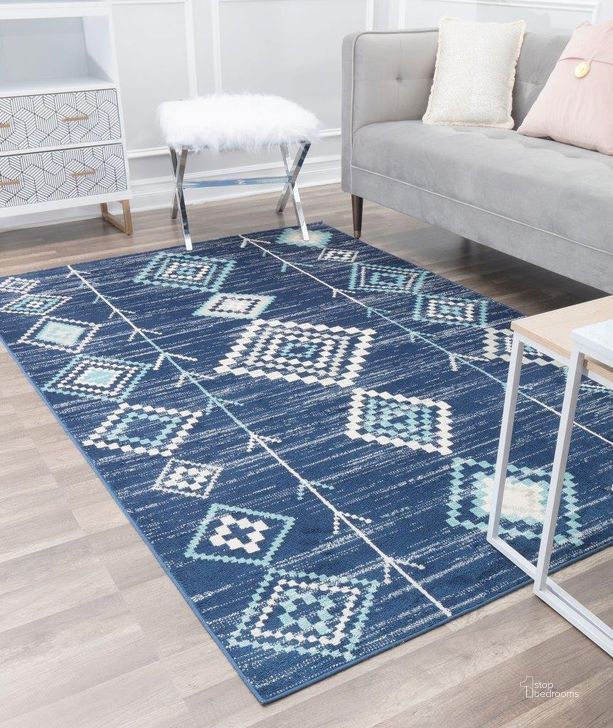 The appearance of CosmoLiving By Cosmopolitan Soleil BR15G Native Blues Tribal Moroccan blue 8'9 x 12' Area Rug designed by Rugs America in the moroccan interior design. This blue piece of furniture  was selected by 1StopBedrooms from Soleil Collection to add a touch of cosiness and style into your home. Sku: RA30446. Material: Polypropylene. Product Type: Area Rugs. Image1