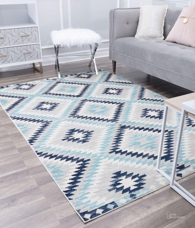 The appearance of CosmoLiving By Cosmopolitan Soleil BR30I Ice Blue Tribal Moroccan blue 8'9 x 12' Area Rug designed by Rugs America in the moroccan interior design. This ice blue piece of furniture  was selected by 1StopBedrooms from Soleil Collection to add a touch of cosiness and style into your home. Sku: RA30485. Material: Polypropylene. Product Type: Area Rugs. Image1