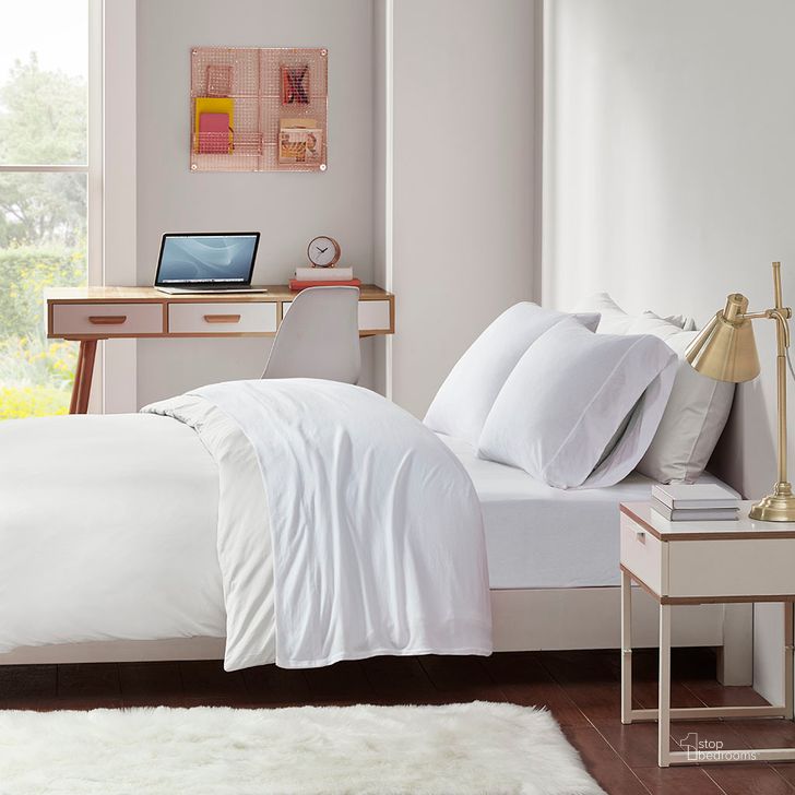 The appearance of Cotton And Polyester Jersey Knit Twin Sheet Set In White designed by Olliix in the transitional interior design. This white piece of furniture  was selected by 1StopBedrooms from Cotton Blend Jersey Knit Collection to add a touch of cosiness and style into your home. Sku: ID20-687. Material: Polyester. Bed Size: Twin. Product Type: Bed Sheet. Image1