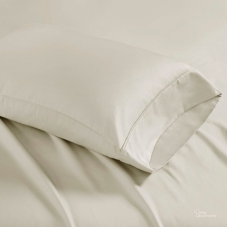 The appearance of Cotton And Polyester Solid King Pillowcase In Ivory designed by Olliix in the transitional interior design. This ivory piece of furniture  was selected by 1StopBedrooms from 1500 Thread Count Collection to add a touch of cosiness and style into your home. Sku: MP21-4849. Material: Polyester. Bed Size: King. Product Type: Pillow Cover. Image1