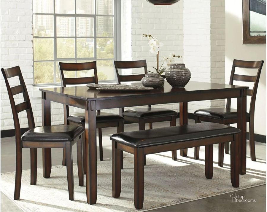 The appearance of Coviar Brown 6 Piece Dining Room Set designed by Signature Design by Ashley in the transitional interior design. This brown piece of furniture  was selected by 1StopBedrooms from Coviar Collection to add a touch of cosiness and style into your home. Sku: D385-325. Product Type: Dining Room Set. Material: Leather Match. Table Top Shape: Rectangular. Image1