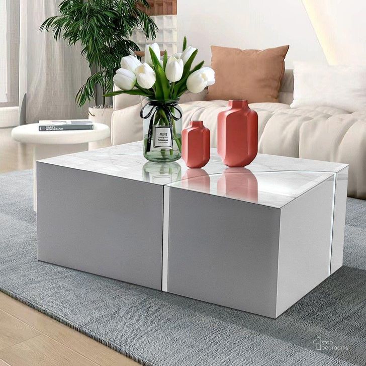 The appearance of Cronos White and Silver Coffee and Cocktail Table designed by Artisan Elegance in the modern / contemporary interior design. This white and silver piece of furniture  was selected by 1StopBedrooms from Cronos Collection to add a touch of cosiness and style into your home. Sku: CTE07202WS. Product Type: Coffee Table. Material: MDF. Image1