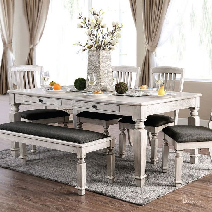 The appearance of Culloden Antique White Dining Set designed by Bennett Interiors in the transitional interior design. This antique white piece of furniture  was selected by 1StopBedrooms from Culloden Collection to add a touch of cosiness and style into your home. Sku: CM3089T;CM3089SC-2PK. Table Base Style: Legs. Material: Wood. Product Type: Dining Room Set. Table Top Shape: Rectangular. Size: 42". Image1