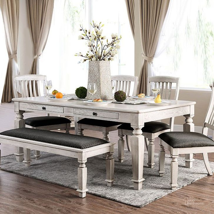 The appearance of Culloden Antique White Dining Table designed by Bennett Interiors in the transitional interior design. This antique white piece of furniture  was selected by 1StopBedrooms from Culloden Collection to add a touch of cosiness and style into your home. Sku: CM3089T. Table Base Style: Legs. Material: Wood. Product Type: Dining Table. Table Top Shape: Rectangular. Size: 42". Image1