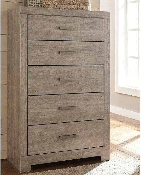 The appearance of Culverbach Gray 5 Drawer Chest designed by Signature Design by Ashley in the transitional interior design. This gray piece of furniture  was selected by 1StopBedrooms from Culverbach Collection to add a touch of cosiness and style into your home. Sku: B070-46. Material: Wood. Product Type: Chest. Image1