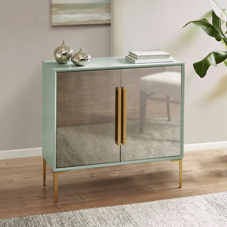 The appearance of Curry 2 Door Accent Chest In Mint designed by Olliix in the glam interior design. This mint piece of furniture  was selected by 1StopBedrooms from Curry Collection to add a touch of cosiness and style into your home. Sku: MP130-0929. Product Type: Chest. Material: MDF. Image1