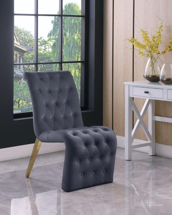 The appearance of Curve Grey Velvet Dining Chair Set of 2 designed by Meridian in the modern / contemporary interior design. This grey velvet piece of furniture  was selected by 1StopBedrooms from Curve Collection to add a touch of cosiness and style into your home. Sku: 920Grey-C. Product Type: Dining Chair. Material: Iron. Image1