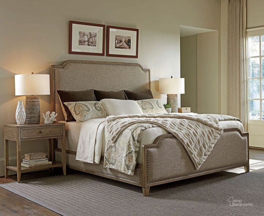 The appearance of Cypress Point Weathered Driftwood Stone Harbour Upholstered Panel Bedroom Set designed by Tommy Bahama in the transitional interior design. This gray piece of furniture  was selected by 1StopBedrooms from Cypress Point Collection to add a touch of cosiness and style into your home. Sku: 01-0561-143C;01-0561-622. Bed Type: Panel Bed. Material: Wood. Product Type: Panel Bed. Bed Size: Queen. Image1